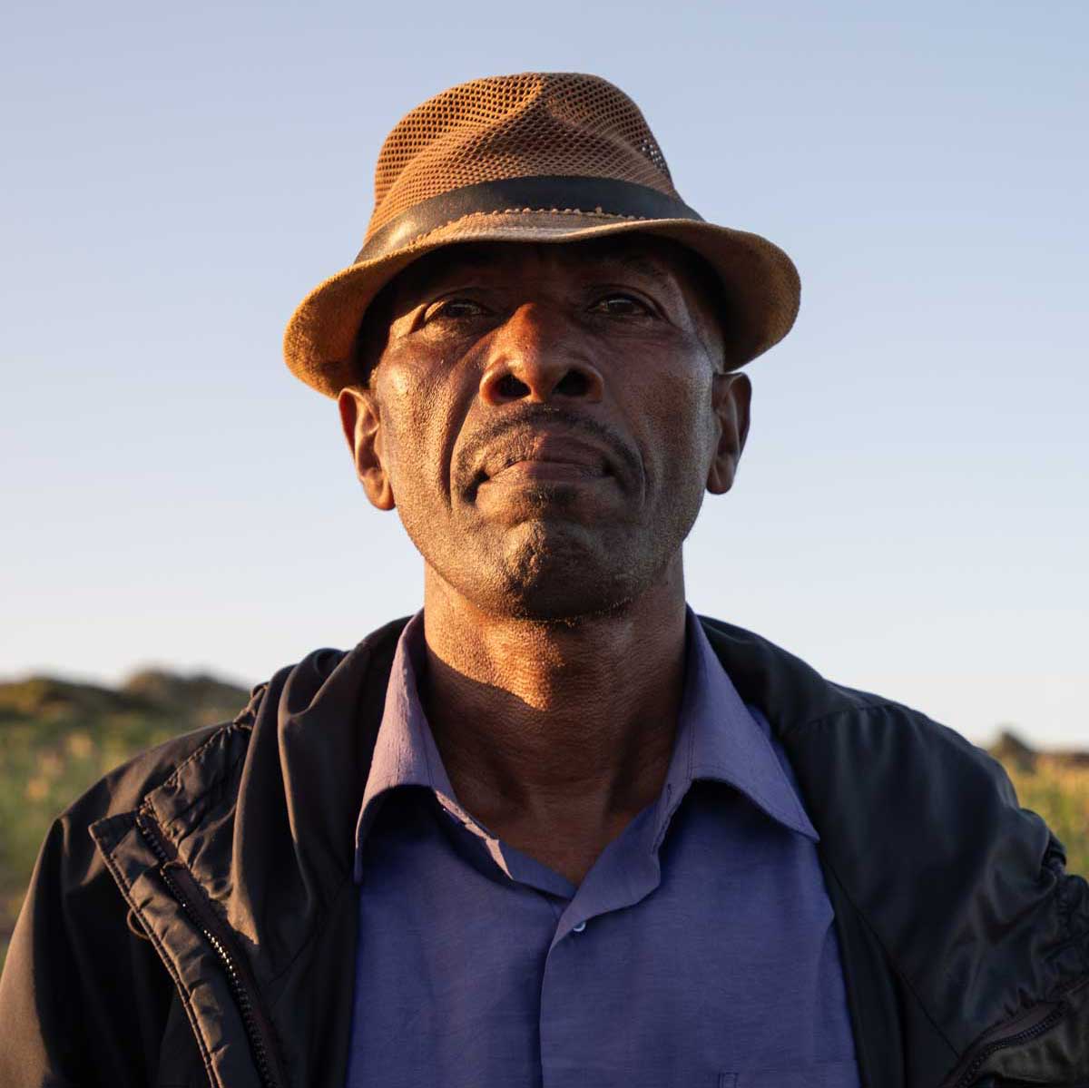 Bernard Soja, is a farmer, fisherman, and bee keeper from Maroalomainty who lost his farm and crops to violent sandstorms that are becoming increasingly more severe and frequent due to climate change. (Daniella van Leggelo-Padilla/World Bank)